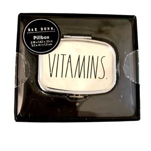 Rae Dunn’s Creamy “VITAMINS” Two Section Pill Box with Black Lettering